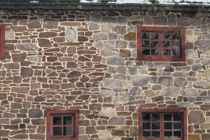 Image #2: 19th century masonry restoration around 2d story window