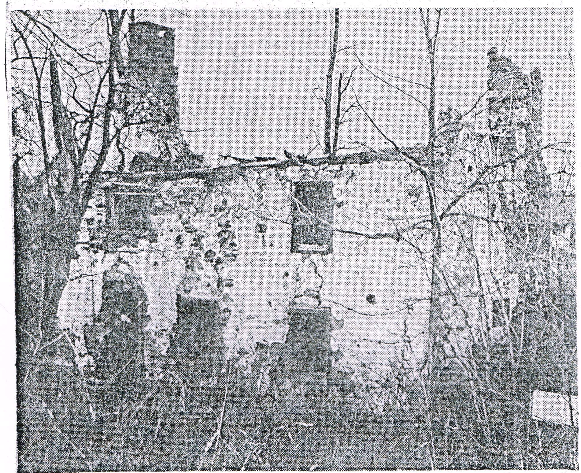 Image#8: View of west eaves wall from a southwest perspective.