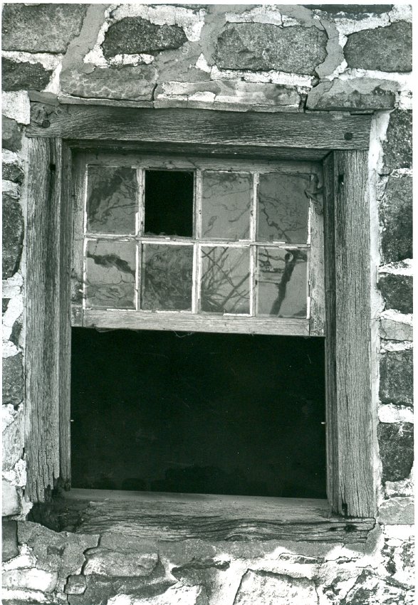 DTH, first-floor north window missing lower sash in east eaves wall (1973)
