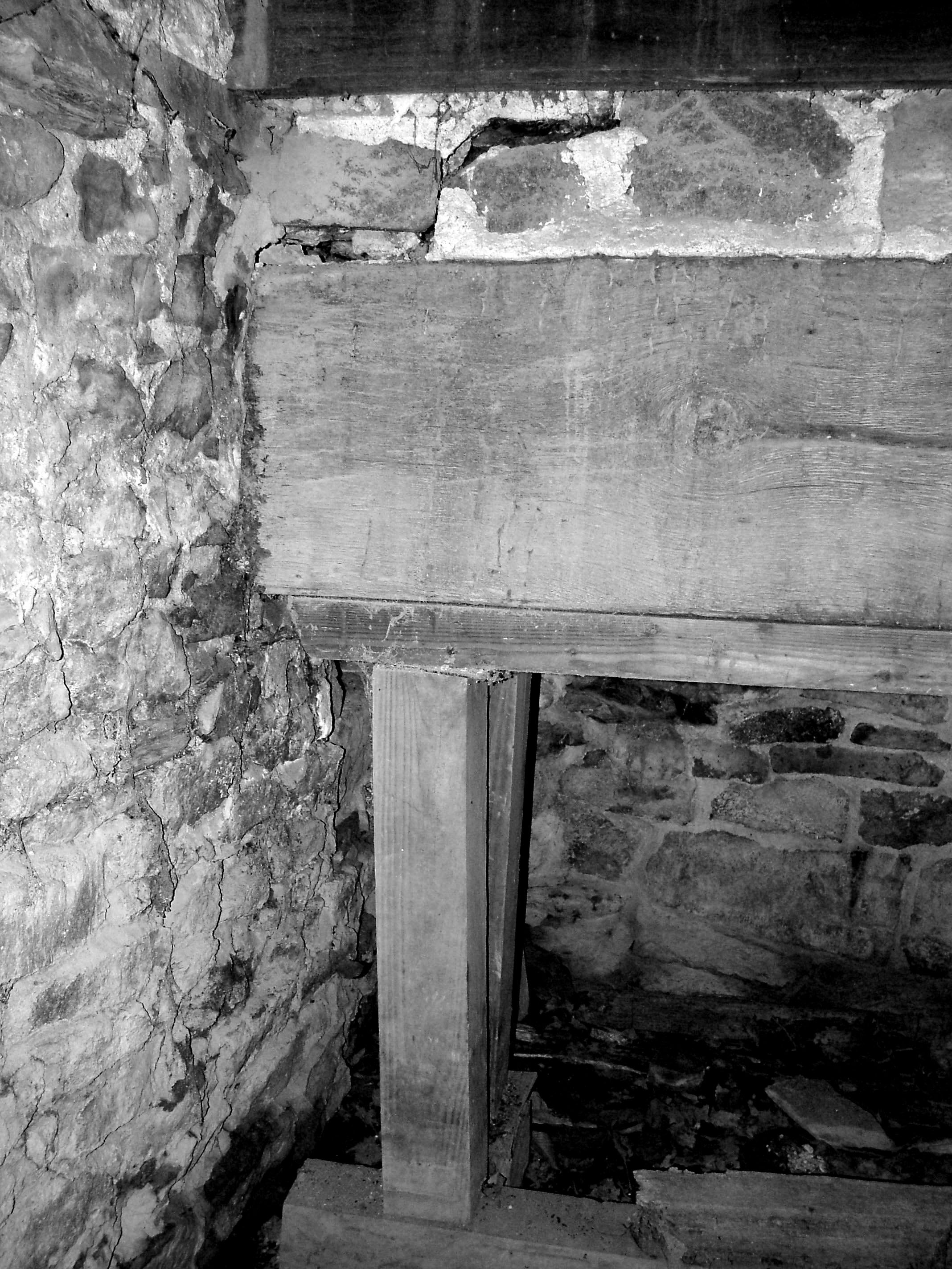 Shoring supporting fireplace lintel, image 1