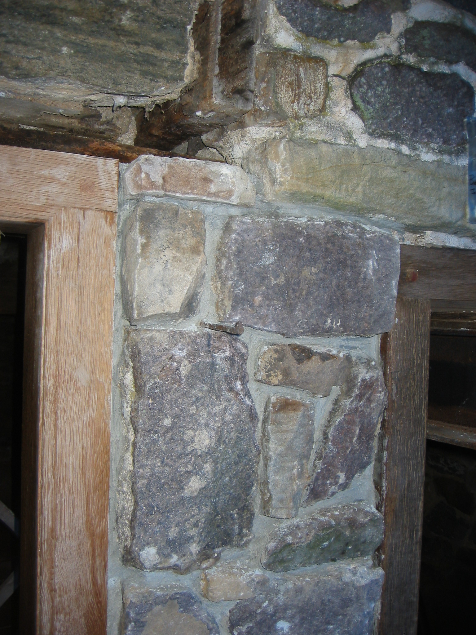 Stone pier between DeTurk kitchen doorway and window jamb (2009)
