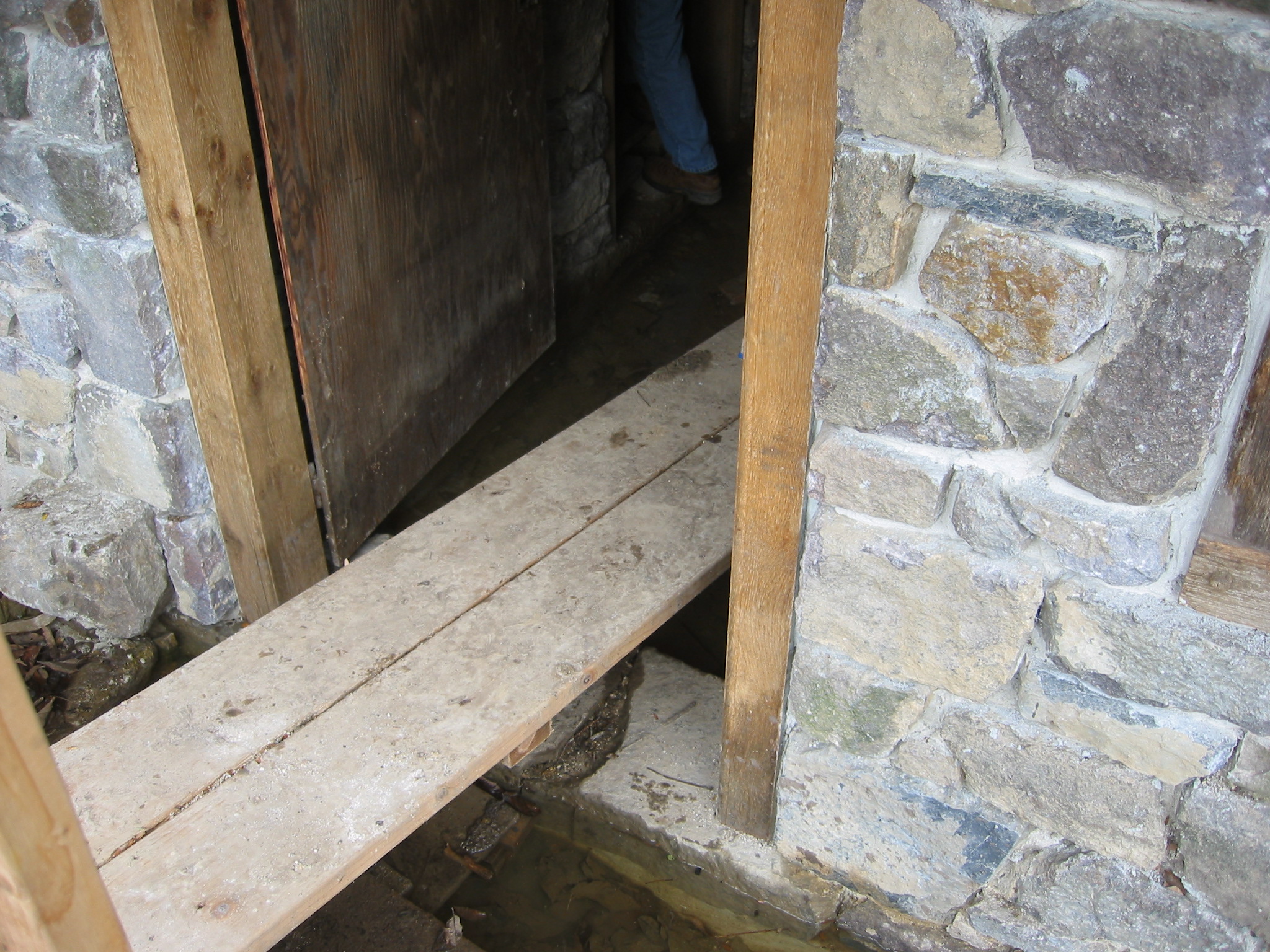 DeTurk, exterior view--stone sill, jambs & masonry piers at kitchen doorway