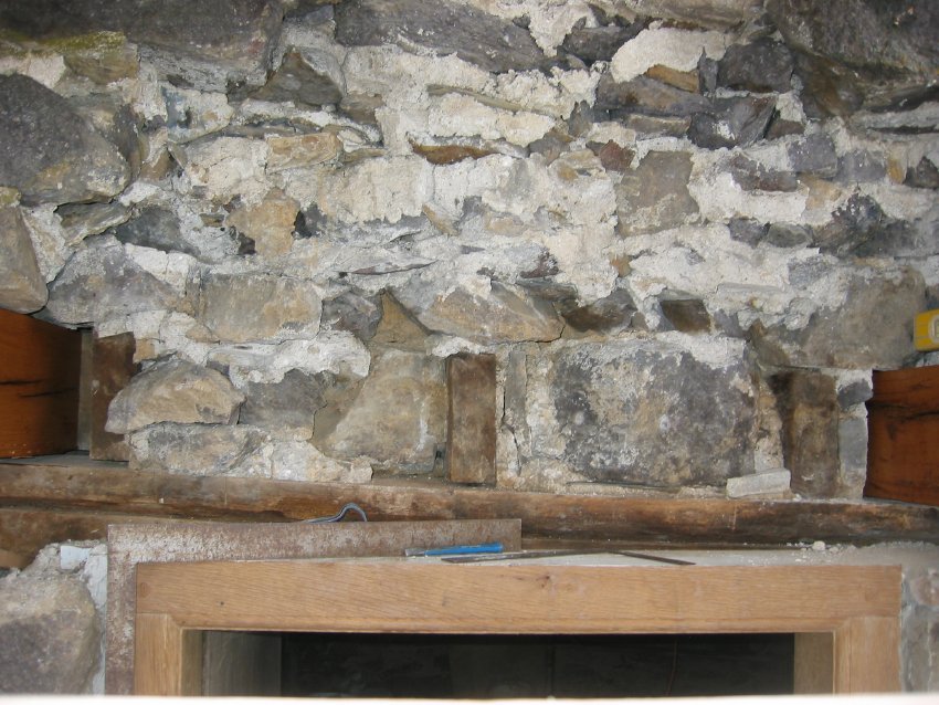 DeTurk , deconstructed masonry wall above kitchen doorway (2009)