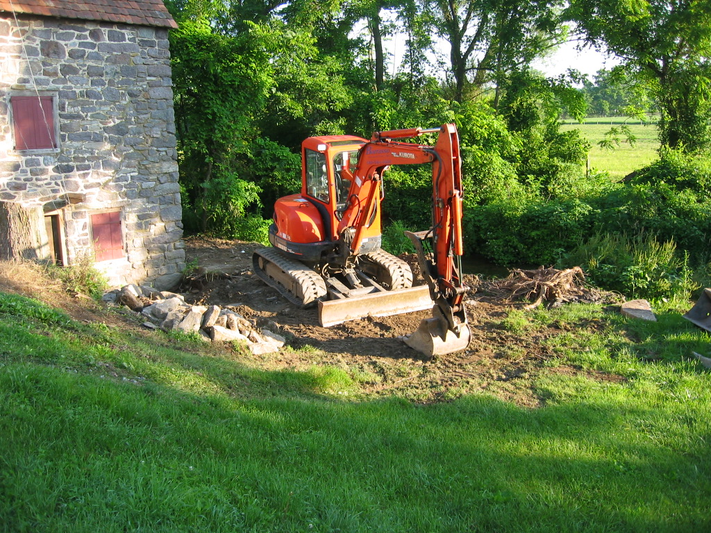 0001-- Excavator to move earth, & set bed-stones, step-blocks, and risers