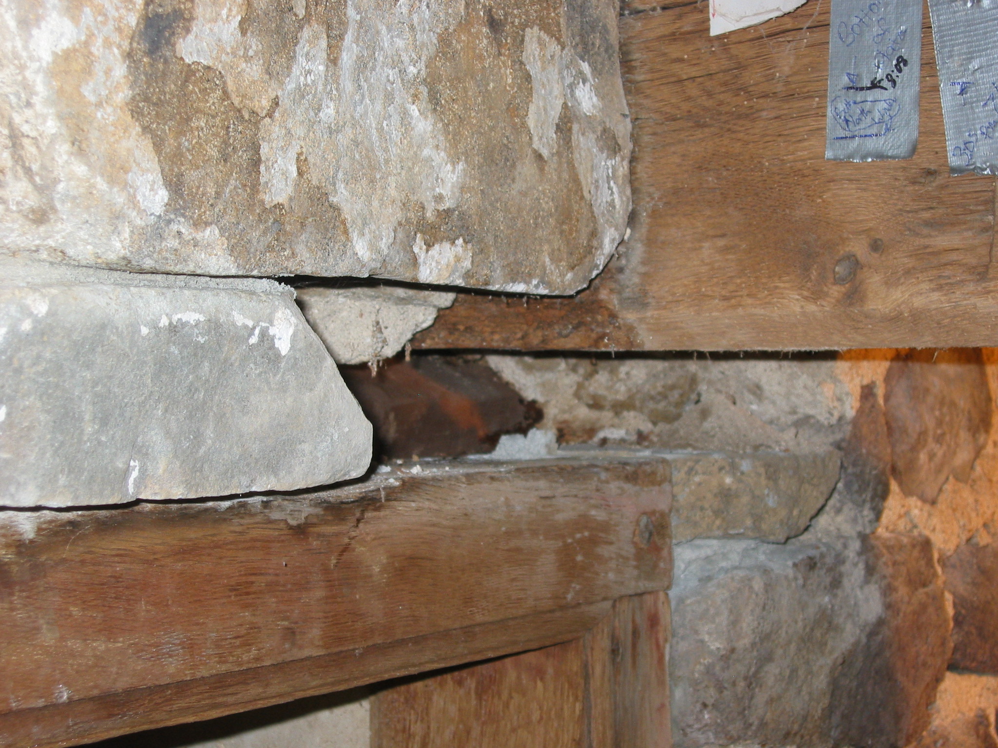 1029, 8/26/09: Detail of 1023, removal of bearing stones in masonry pocket