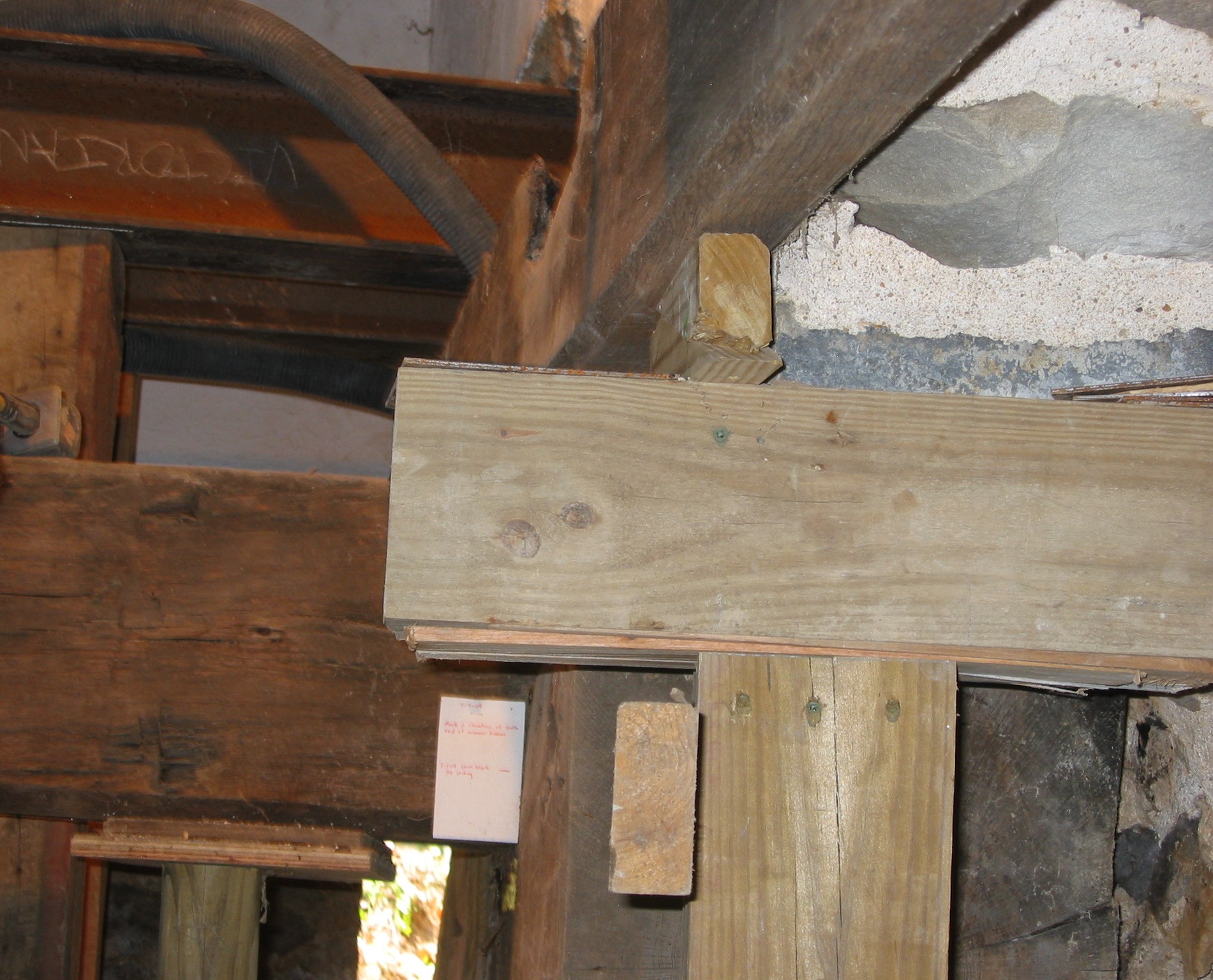 949, 8/18/09: Summer beam; “needled” steel I-beam as temporary shoring