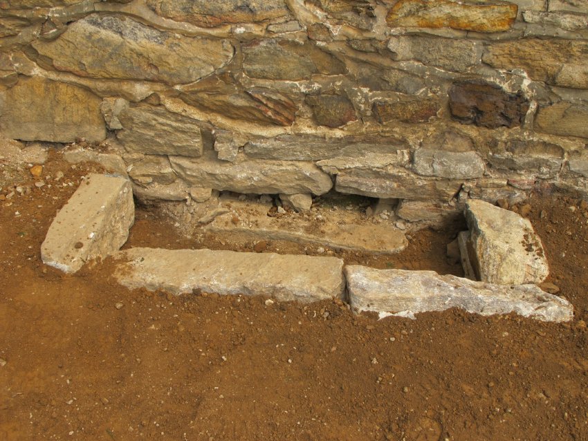 #9, 5854: cellar window and stone “well”, W gable end