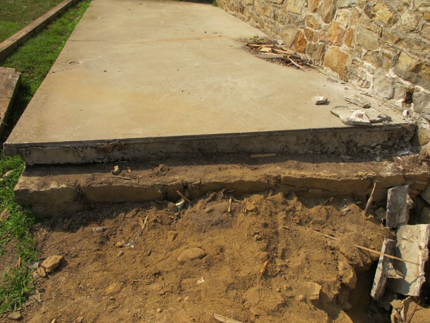 #22, 4394: concrete porch slab and step on west gable wall