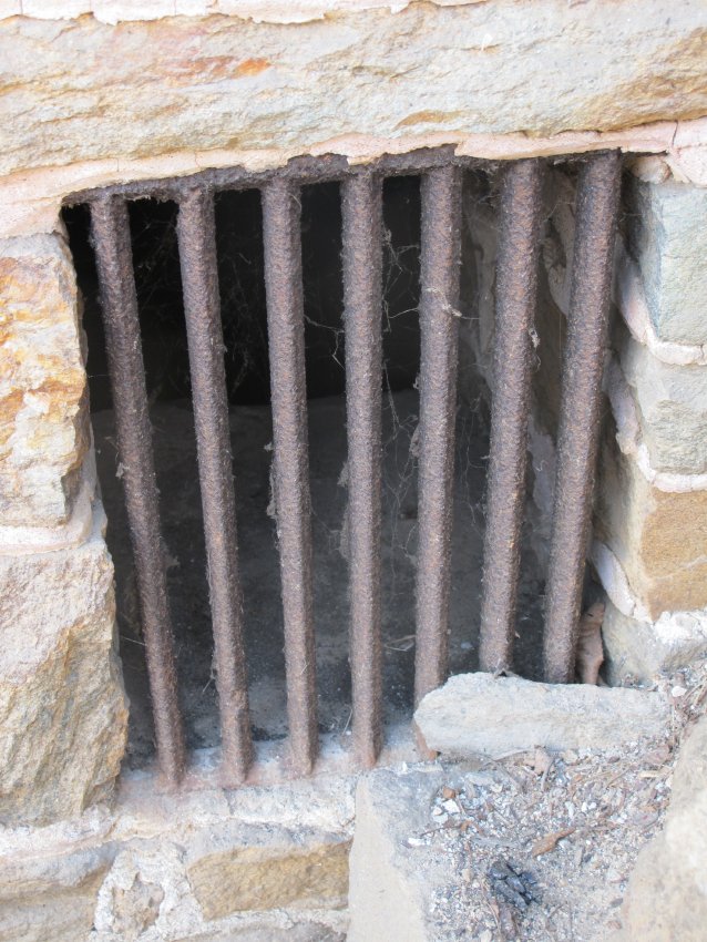 #36, 4629: early iron grille in cellar vent opening