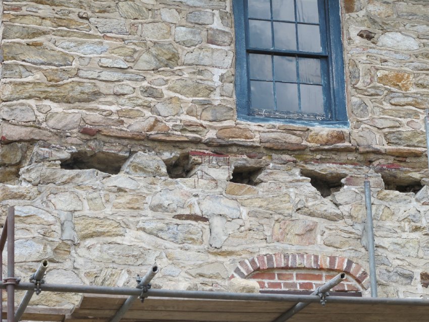 #42, 4787: detail of 1930s porch rafter pockets under 1753 flashing course