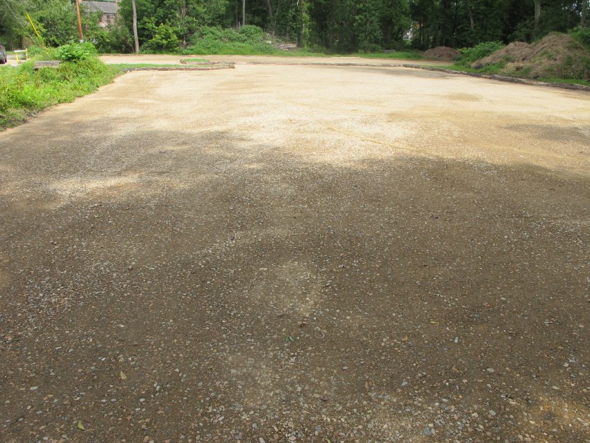 #5, 9836: completed and tamped parking surface on areas 2 & 3
