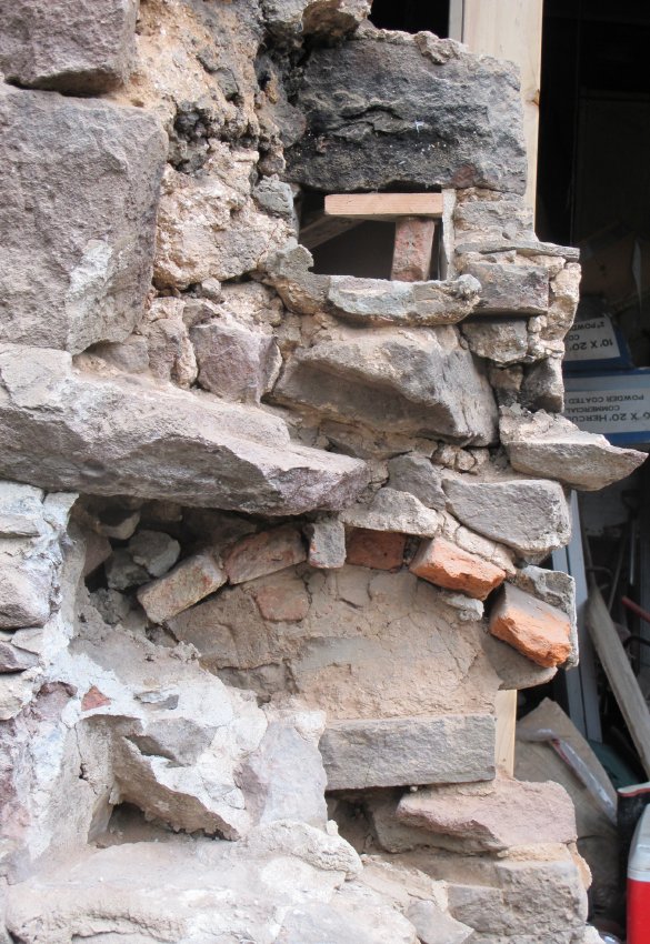 Image #7: 6309: Brick and stone remnants of arched oven, Douglass fireplace