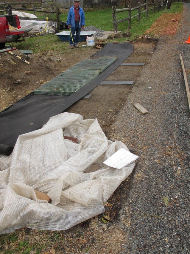 #12, 6840-Keim DW ramp with steel bed-plates, geo-textile, and first grate