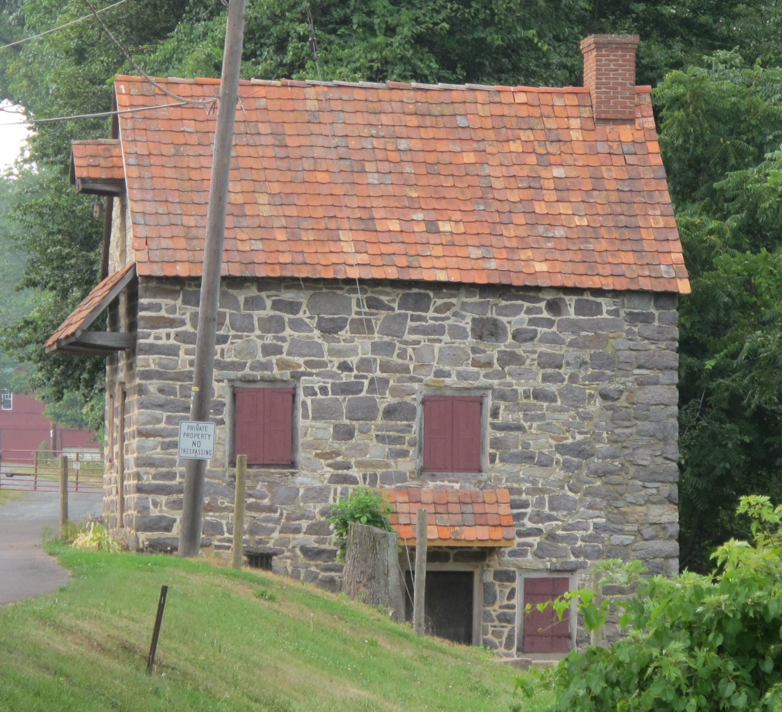 4779-East elevation of DeTurk House with re-tiled doorway hood