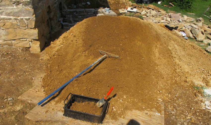 Image #14, 5246: excavated clay to be screened for artifacts, and back-fill