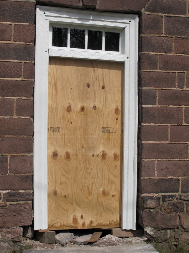 #5, 7642-Restored door frame with transom in Douglass façade