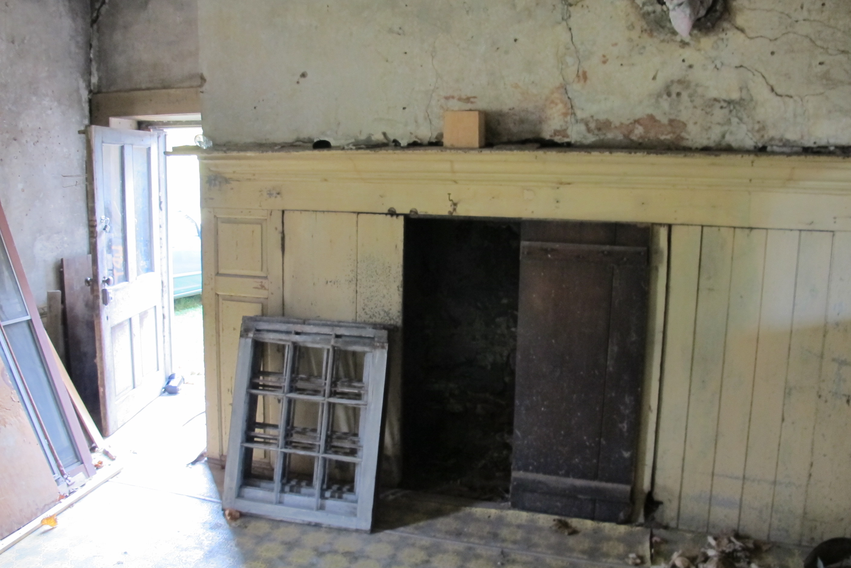#4: Douglass house kitchen fireplace and doorway [left] in gable-end wall