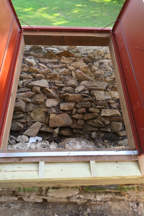 #14, photo 15: View of extrados stones through exhibit doors