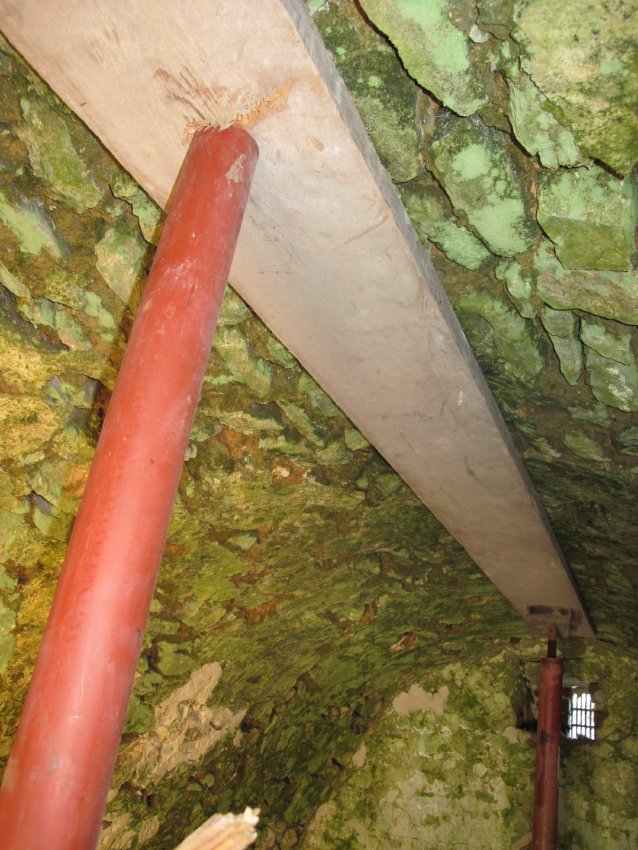 #5, photo 6936: Centering support on post in root cellar vault