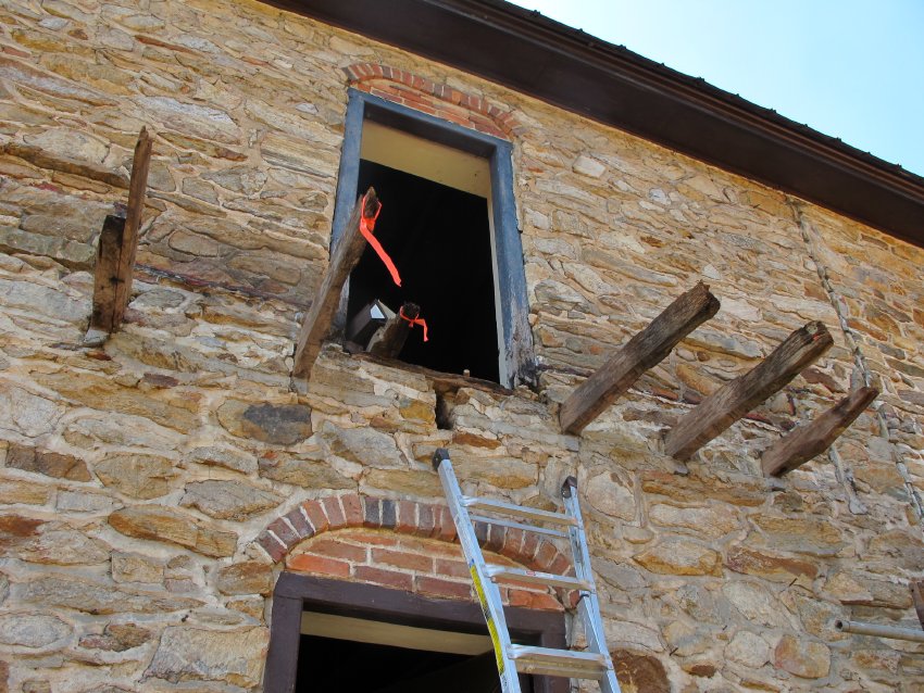 #50: cantilevered original "outlookers" to support restored balcony