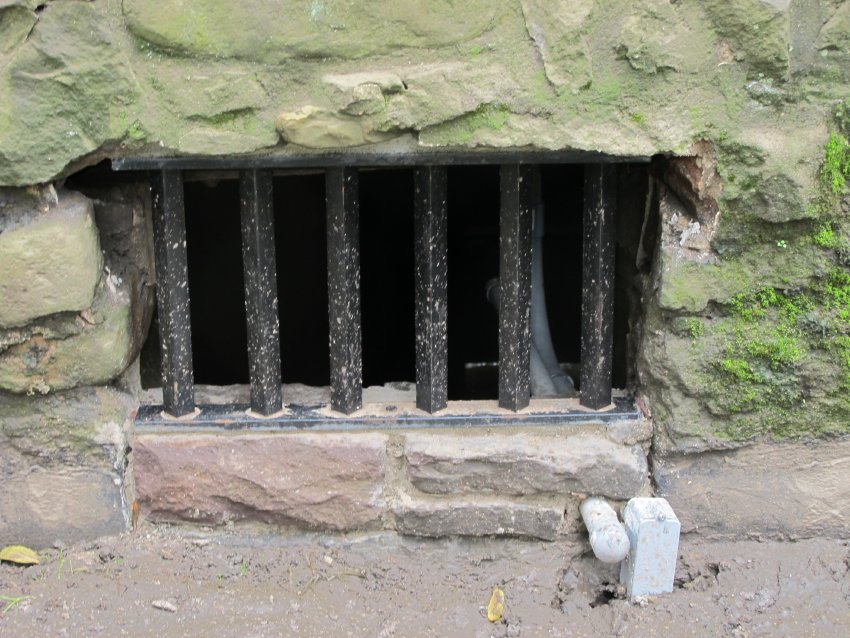 #13: 6233: Re-fabricated cellar vent iron grille in Fulp House