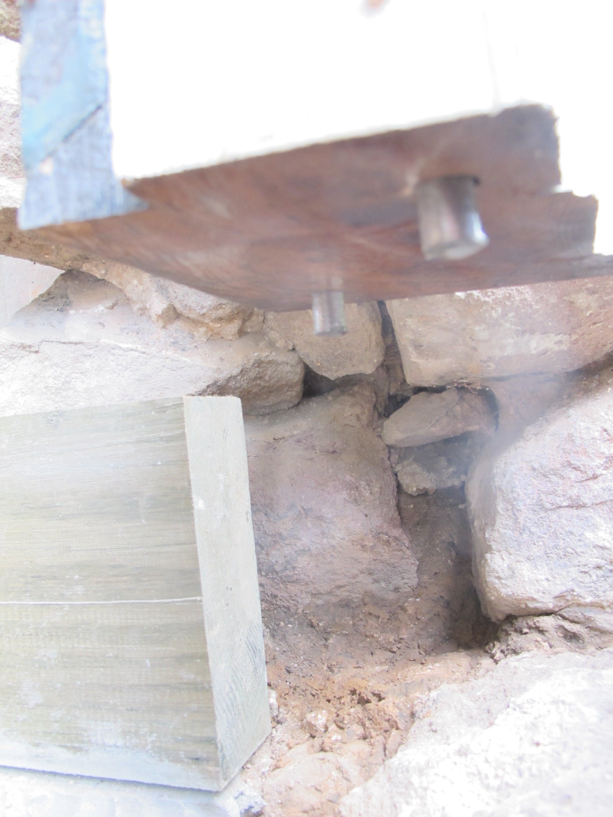 #1, 8427: Steel anchor pins protruding from oak door jambs