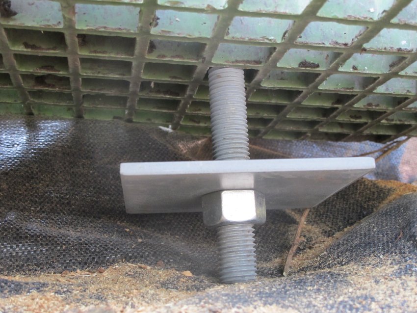 #12, photo 8261, 4/19/12: Bearing plate and nut under anchor grate