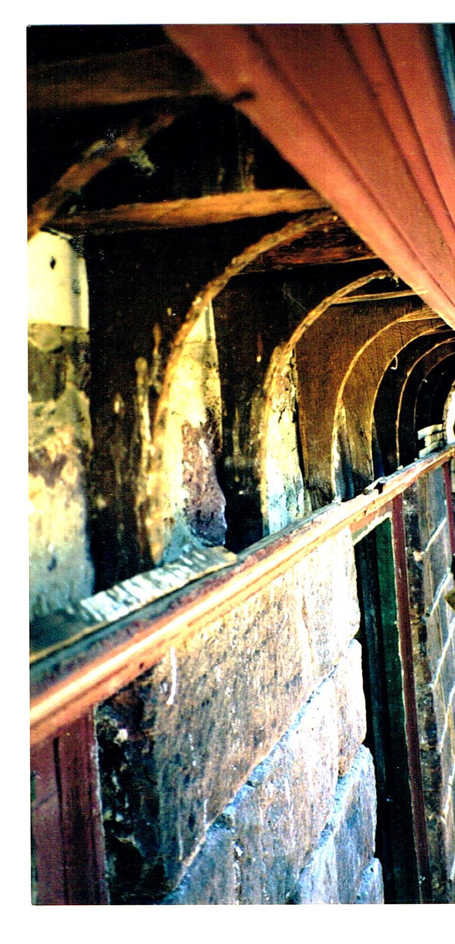 #10: Coved brackets suspended from attic joists for cornice plaster