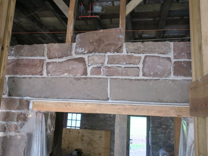 #2: Pair of stone lintels spanning doorway in restored wall