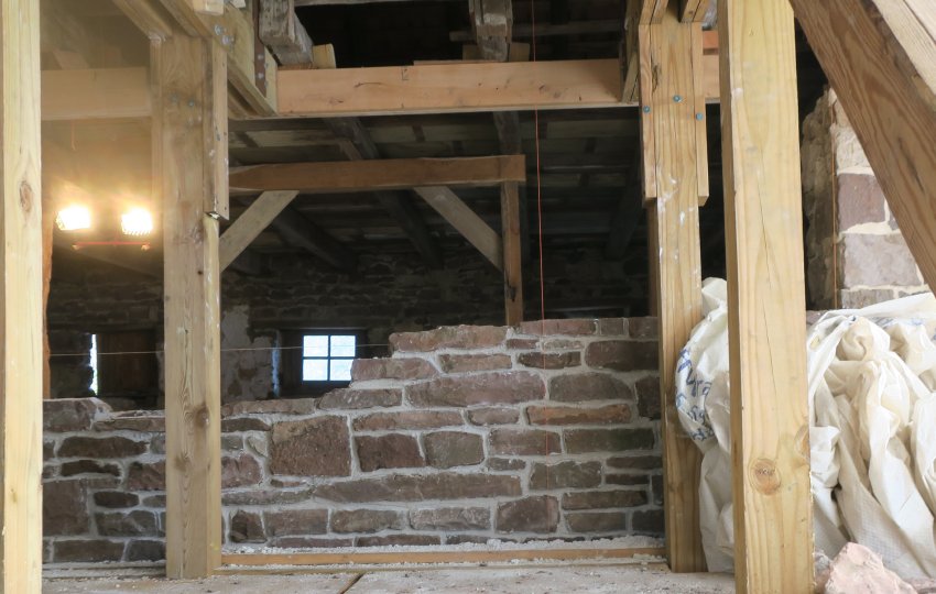 #8: Restored masonry wall above 2d floor