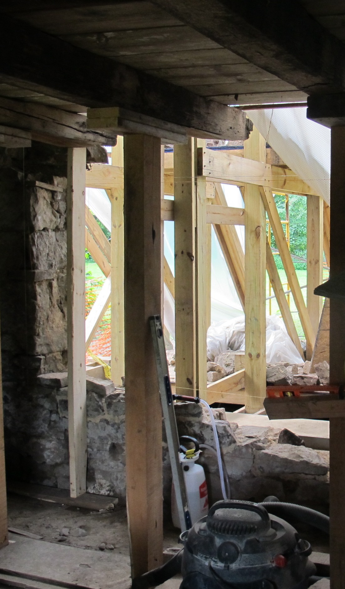 Unstable wall removed to foundation plinth