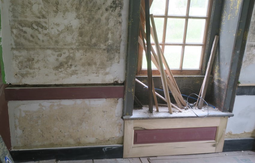 #5: Unrestored plaster and re-fabricated wainscot panel in back parlor