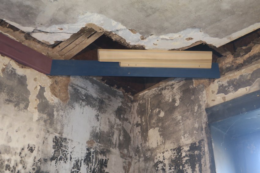 #7: Missing plaster and lath, ceiling of back parlor