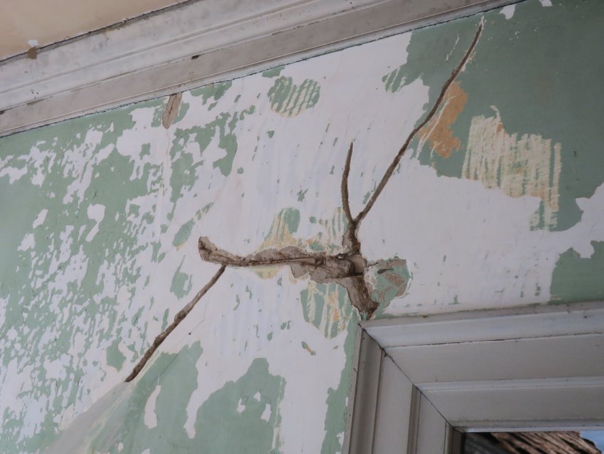 #4: Raked-out scratches in plaster wall, prepared for in-filling