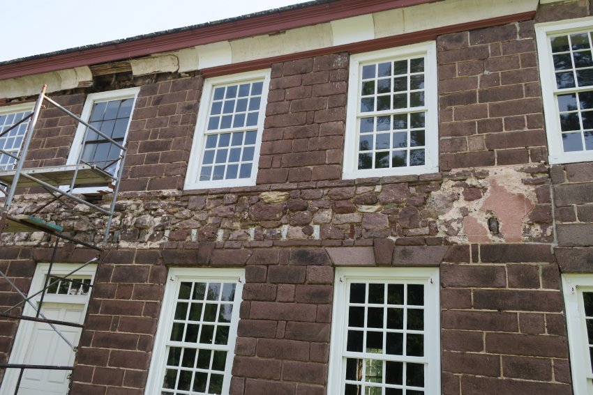 #1: Façade cove cornice prior to restoration