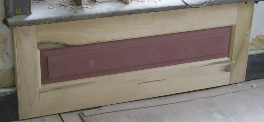 Image #12: Replicated wainscot apron panel under back window in back parlor