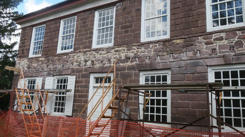 #10: Rubble-stone back-wall delineating re-fabricated pent roof perimeter
